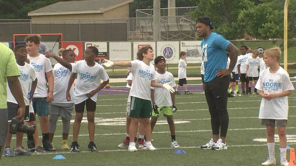 Panthers wide receiver DJ Moore hosts football camp for hundreds of local kids