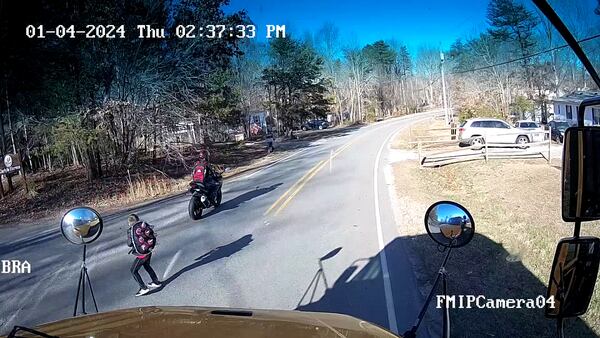 Close call: Motorcycle nearly hits kid while passing stopped Iredell Co. school bus
