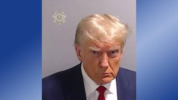 Trump surrenders to face Georgia election charges, mug shot released