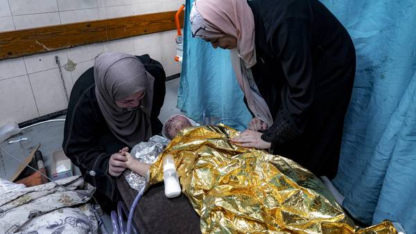 Wounded in a strike that killed her family, a 2-year-old joins Gaza's ranks of thousands of orphans