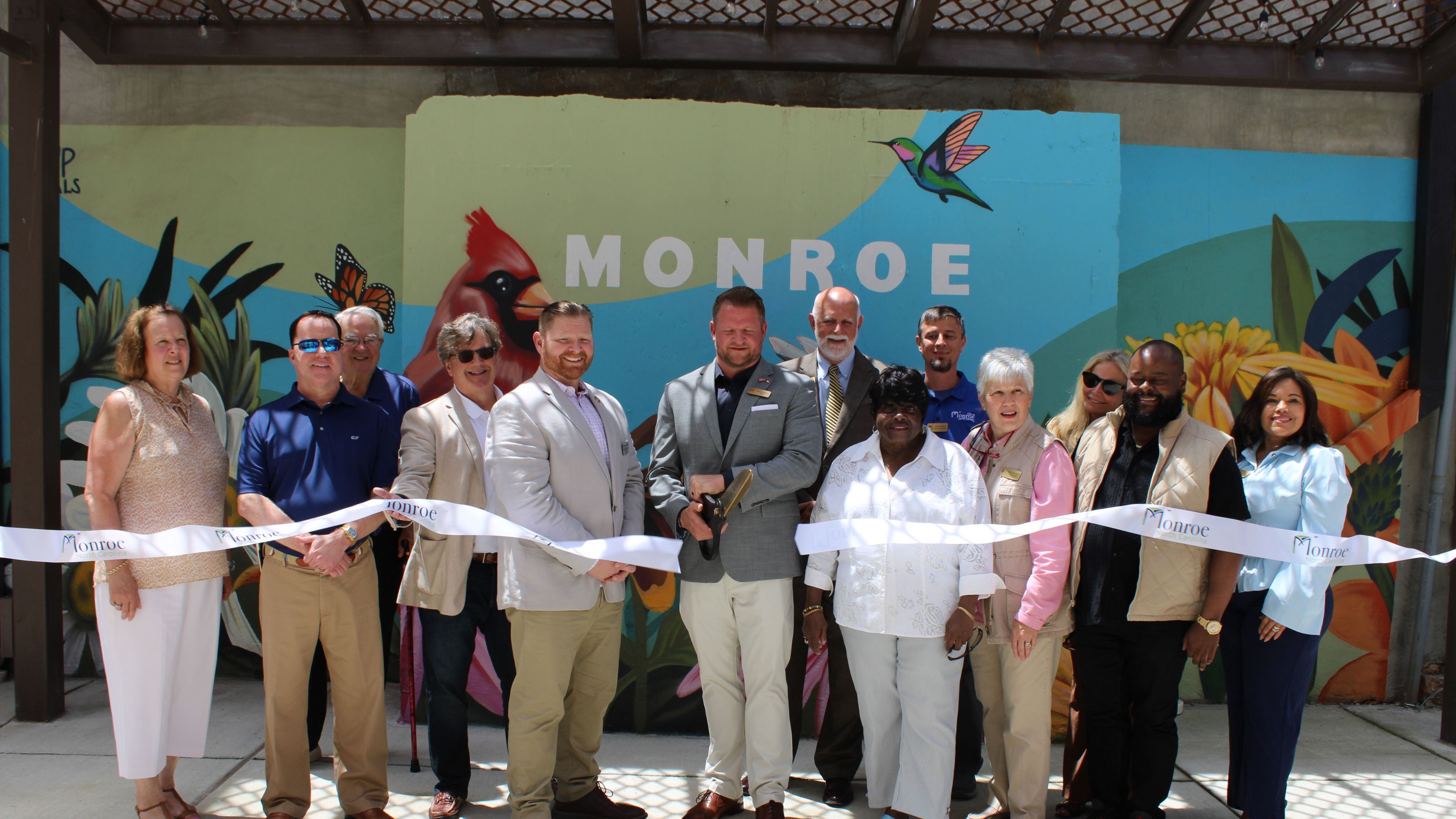 ‘The place to be’: City of Monroe cuts ribbon on new project in downtown alley