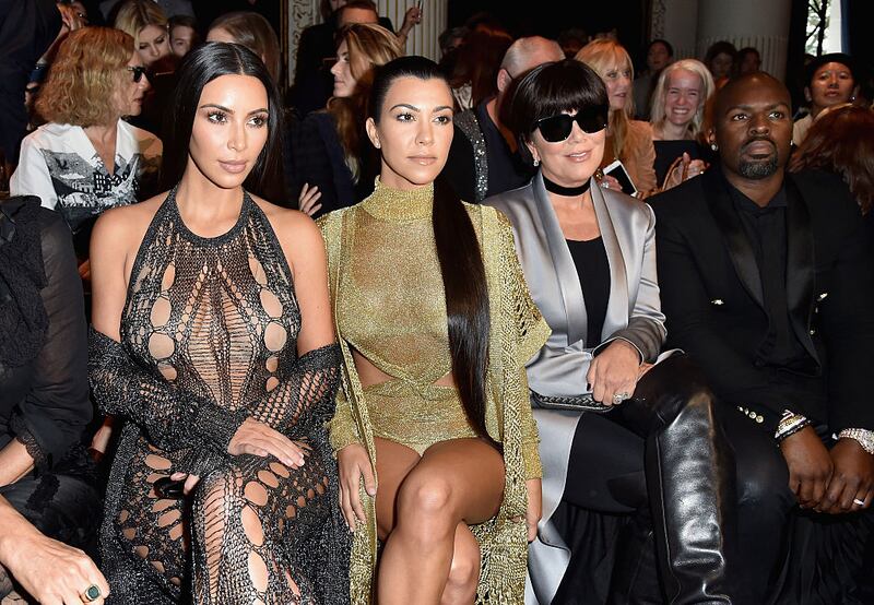 PARIS, FRANCE - SEPTEMBER 29:  Kim Kardashian, Kourtney Kardashian, Kris Jenner and Corey Gamble attend the Balmain show as part of the Paris Fashion Week Womenswear  Spring/Summer 2017  on September 29, 2016 in Paris, France.  (Photo by Pascal Le Segretain/Getty Images)