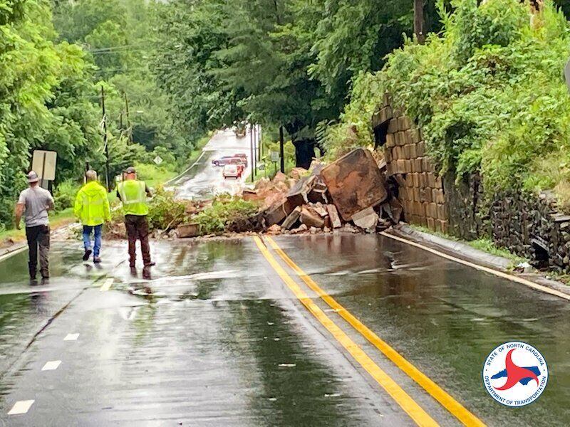 AUGUST 17, 2021 - A collapsed rock retaining wall near Church Street in Canton has closed both directions of U.S. 19/23 in Haywood County. (Photo credit: NCDOT)