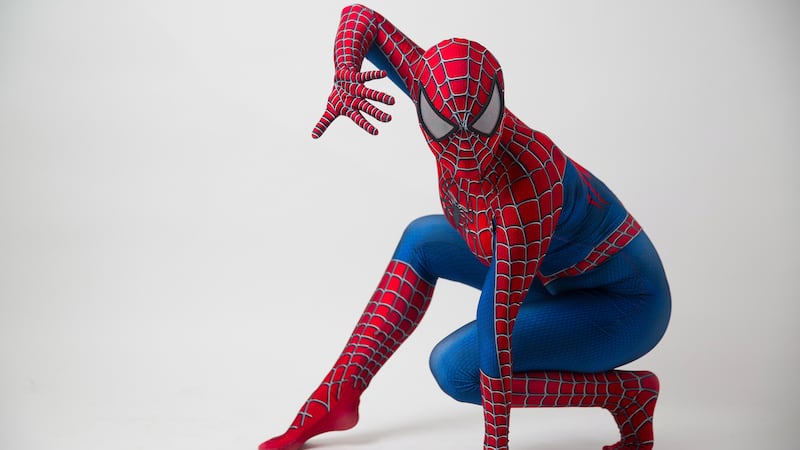 ‘Spider-Man’ swings into action, helps wheelchair-bound man cross intersection