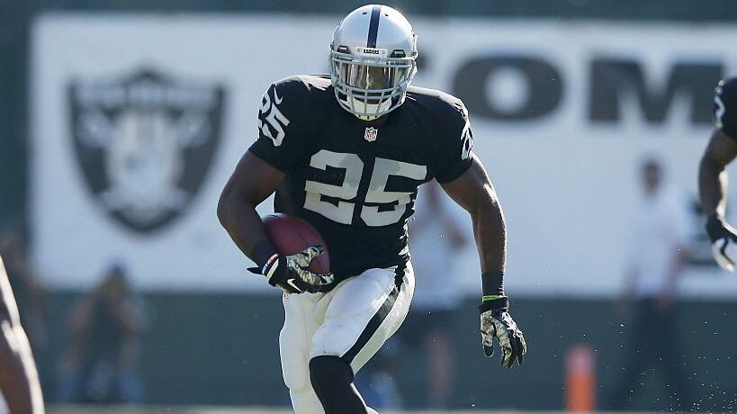 OAKLAND, CA - NOVEMBER 09: D.J. Hayden #25 of the Oakland Raiders carries downfield against the Denver Broncos in the first half at O.co Coliseum on November 9, 2014 in Oakland, California. (Photo by Ezra Shaw/Getty Images)