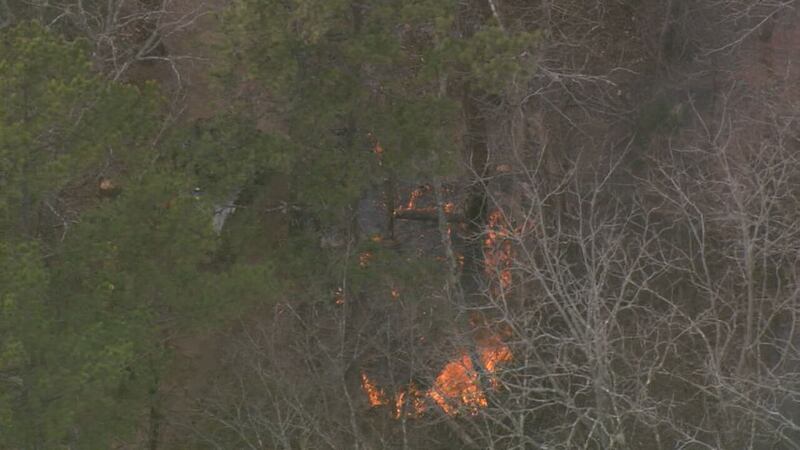 Controlled burn in northwest Charlotte sends smoke into the air on Thursday