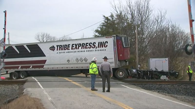 An Amtrak train was stopped in Gaston County early Tuesday morning after hitting a tractor-trailer.