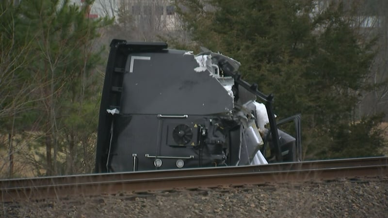 An Amtrak train was stopped in Gaston County early Tuesday morning after hitting a tractor-trailer.