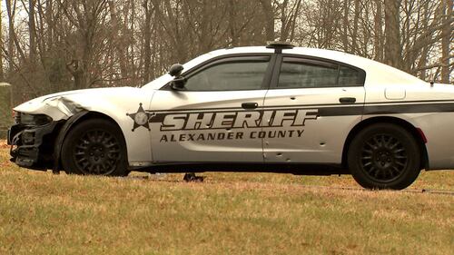 A suspect is in custody after officials said he stole a deputy's patrol car following a police chase in Alexander County on Friday, Dec. 17, 2021.