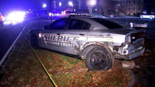 Dozens of police officers and deputies responded after a deputy was hit and injured by a stolen patrol car in Alexander County on Friday, Dec. 17, 2021.