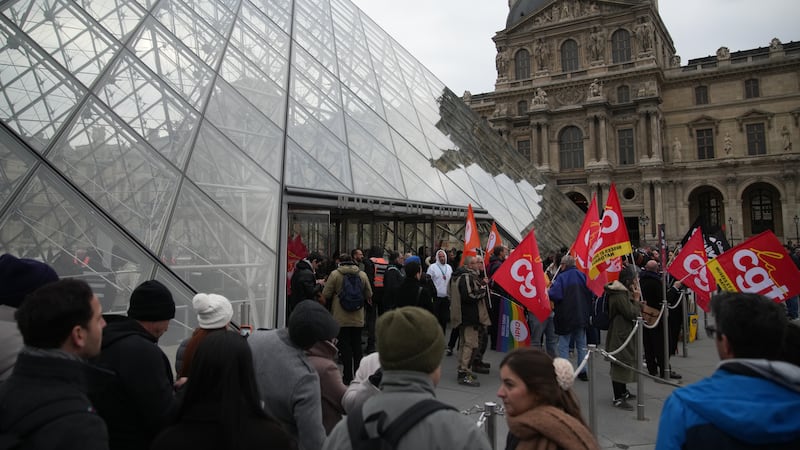 Louvre workers vote to extend a strike as the museum partially reopens