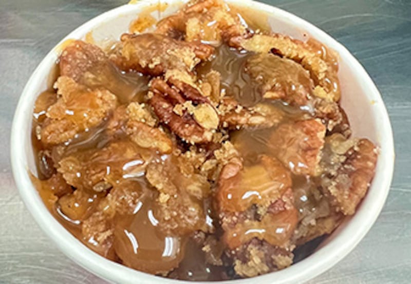 Cinnamon Peach Praline Cobbler Topped with Caramel

The Peach Cobbler Factory