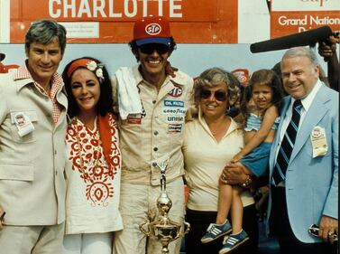 Bruton Smith in Victory Lane with Richard Petty and Liz Taylor.