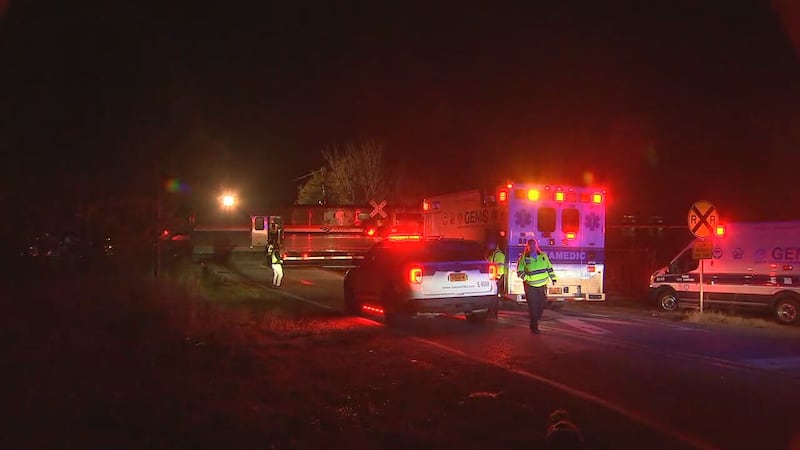 An Amtrak train was stopped in Gaston County early Tuesday morning after hitting a tractor-trailer.