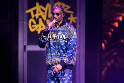 Snoop Dogg performs during the High School Reunion Tour 2023 at PNC Music Pavilion in Charlotte on Aug. 8, 2023.