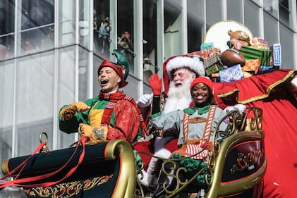 NEW YORK, NEW YORK - NOVEMBER 23: A person depicting Santa Claus participates in Macy's annual Thanksgiving Day Parade on November 23, 2023 in New York City. Thousands of people lined the streets to watch the 25 balloons and hundreds of performers march in this parade happening since 1924. (Photo by Stephanie Keith/Getty Images)