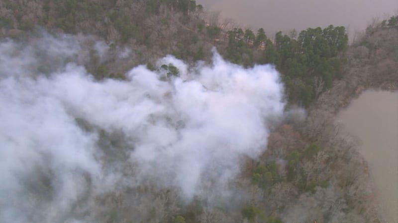 Controlled burn in northwest Charlotte sends smoke into the air on Thursday