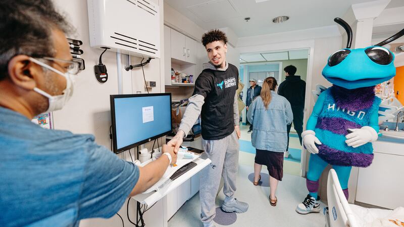 Charlotte Hornets players LaMelo Ball and Vasilije Micic along with Hugo the Hornet visited Novant Health Hemby Children’s Hospital on April 8, 2024. The group went room-to-room delivering and autographing Hugo children’s books and visiting with patients and their families.