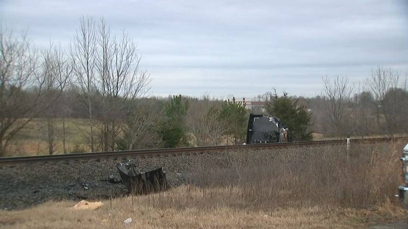 An Amtrak train was stopped in Gaston County early Tuesday morning after hitting a tractor-trailer.