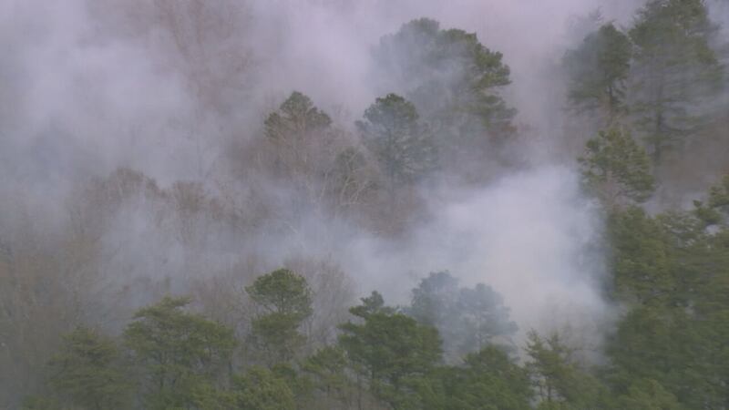 Controlled burn in northwest Charlotte sends smoke into the air on Thursday