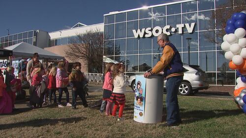 Viewers arrive at the WSOC-TV studios on Dec. 6, 2023, to drop off their coats for the 20th annual Steve’s Coats for Kids Collection Day.