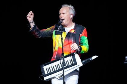 Howard Jones and his band perform at PNC Music Pavilion in Charlotte on July 19, 2023.