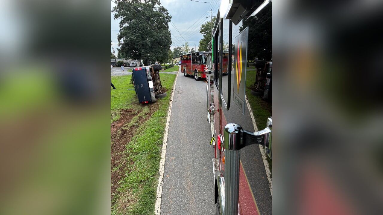 Huntersville Fire crews rescue driver from overturned truck