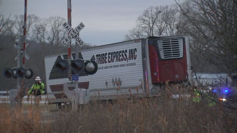 An Amtrak train was stopped in Gaston County early Tuesday morning after hitting a tractor-trailer.