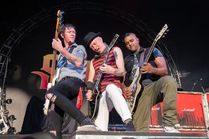 Sum 41 perform during the “Let The Bad Times Roll” tour at PNC Music Pavilion in Charlotte on Aug. 18, 2023.