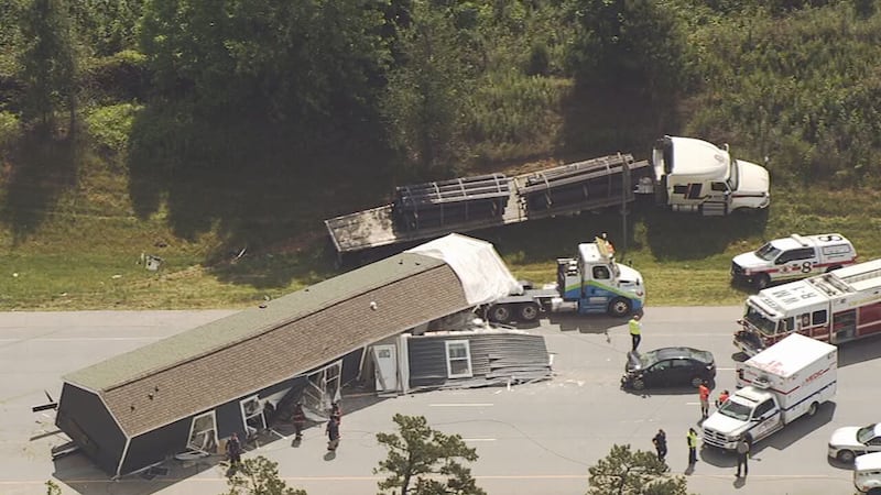 A tractor-trailer carrying a mobile home crashed, closing the inner loop of I-485.