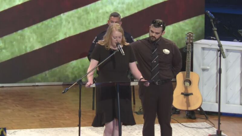 Ashley Ayer, wife of CMPD officer Joshua Eyer, speaks at the funeral.