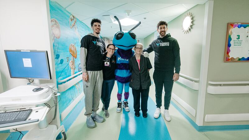 Charlotte Hornets players LaMelo Ball and Vasilije Micic along with Hugo the Hornet visited Novant Health Hemby Children’s Hospital on April 8, 2024. The group went room-to-room delivering and autographing Hugo children’s books and visiting with patients and their families.