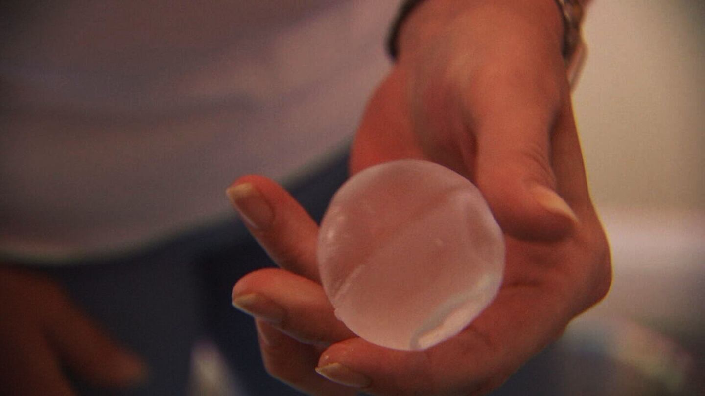 The craft ice maker in a LG refrigerator makes round ice cubes.