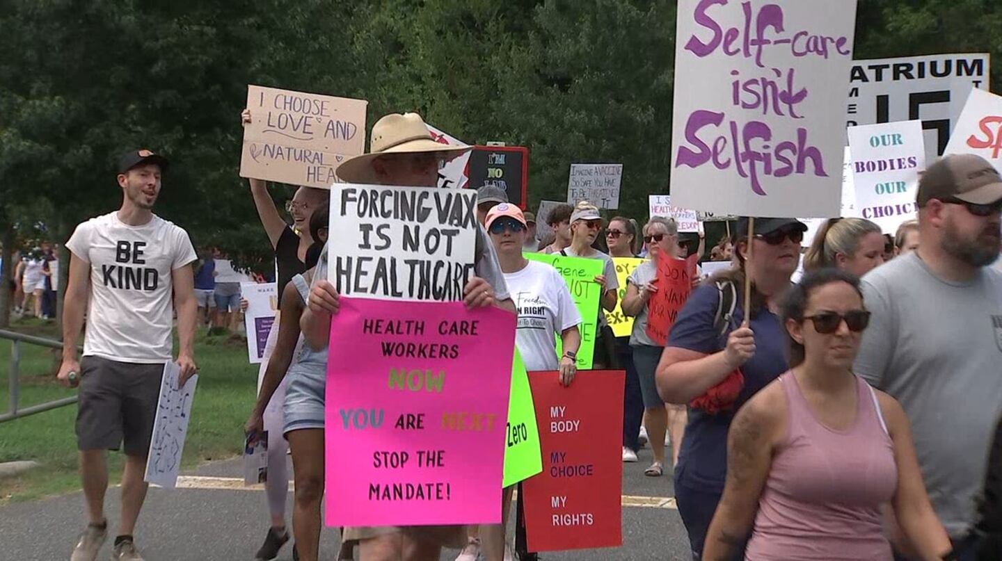 Hundreds of people gathered at Freedom Park in Charlotte to make their voices heard against Atrium and Novant Health’s COVID-19 vaccine mandate for employees.