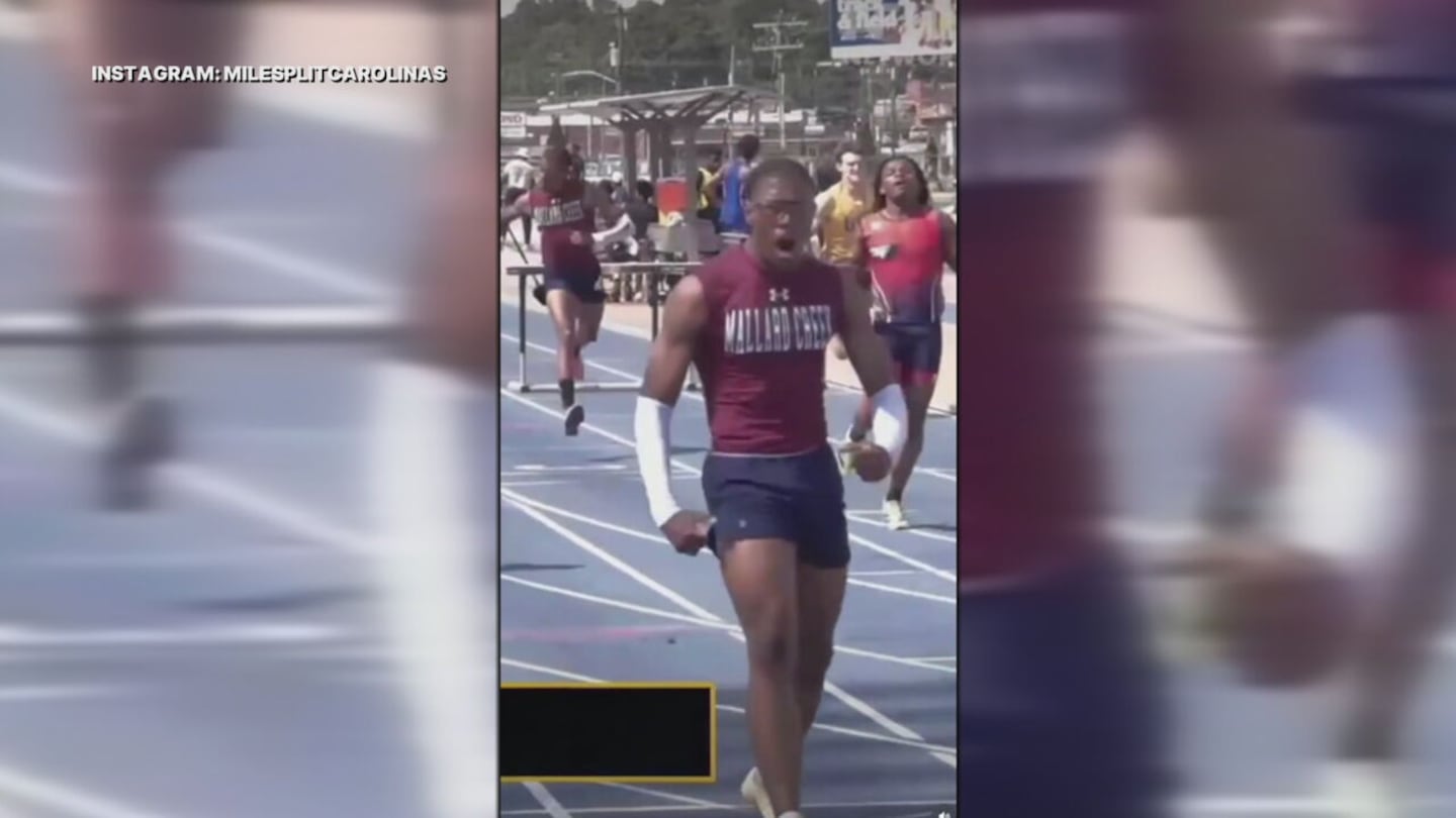 Nyan Brown reacts after breaking a near 20-year state record in 300-meter hurdles