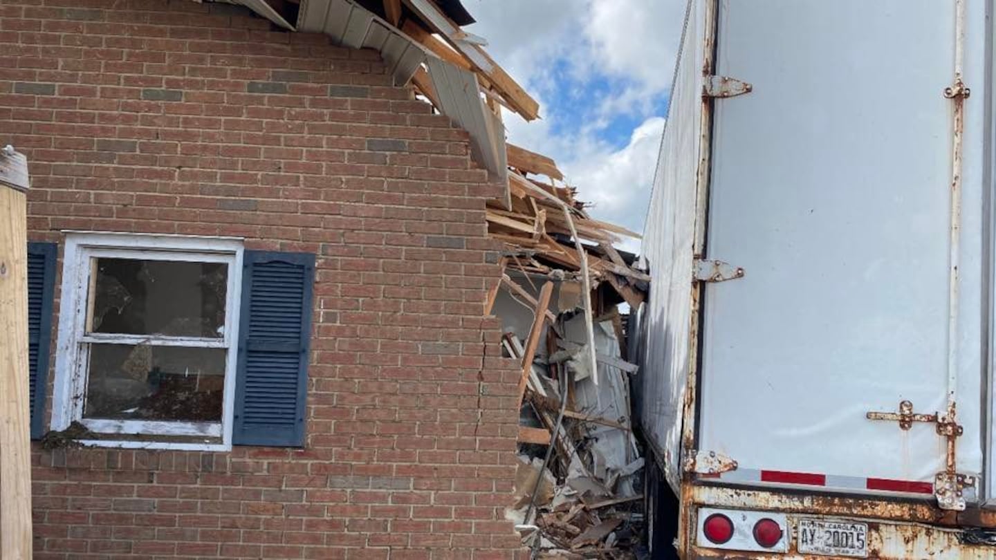 A tractor-trailer slammed into a home in Alexander County.