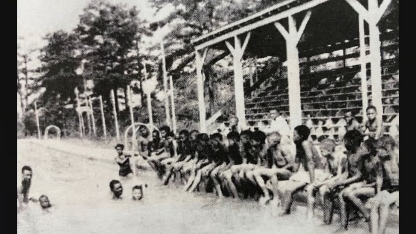 Historical photo of swimmers in segregated Charlotte.