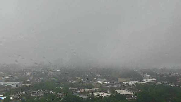 Uptown Charlotte enveloped in clouds, rain as thunder rumbles in the area