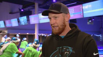 Panthers punter kicks off holiday season by giving back to area children