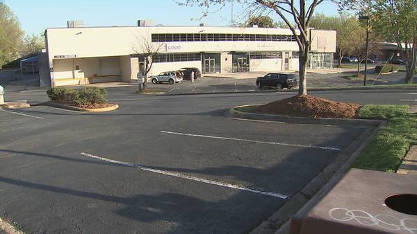 Arrest warrant issued for business owner following controversy over parking lot