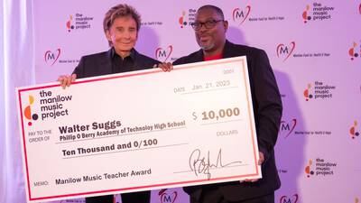 Photos: Barry Manilow awards CMS teacher $10,000