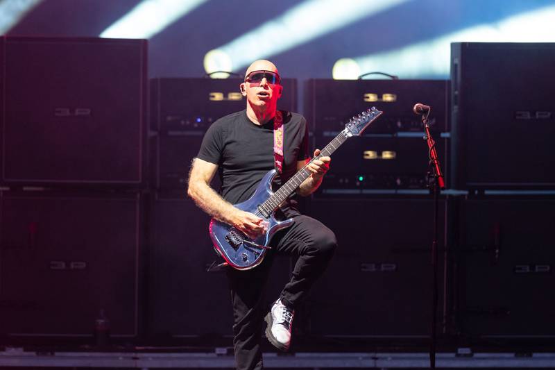 Joe Satriani performs during the Best of All Worlds Tour at PNC Music Pavilion on July 19, 2024.