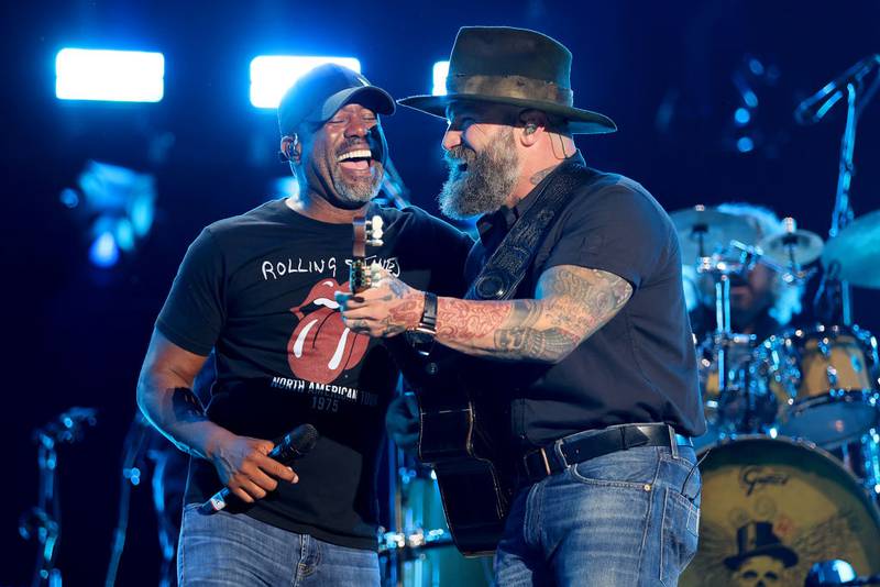 NASHVILLE, TENNESSEE - JUNE 09: (L-R) Darius Rucker and Zac Brown of Zac Brown Band perform during day 1 of CMA Fest 2022 at Nissan Stadium on June 09, 2022 in Nashville, Tennessee. (Photo by Jason Kempin/Getty Images)